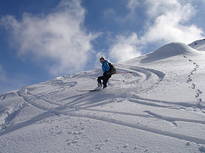 Skier on a snowy mountain